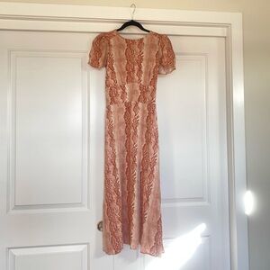 AFRM pink/peach printed dress with cap puff sleeves, open back and thigh slit